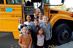 Ken-Ton bus driver smiles with Ken-Ton students